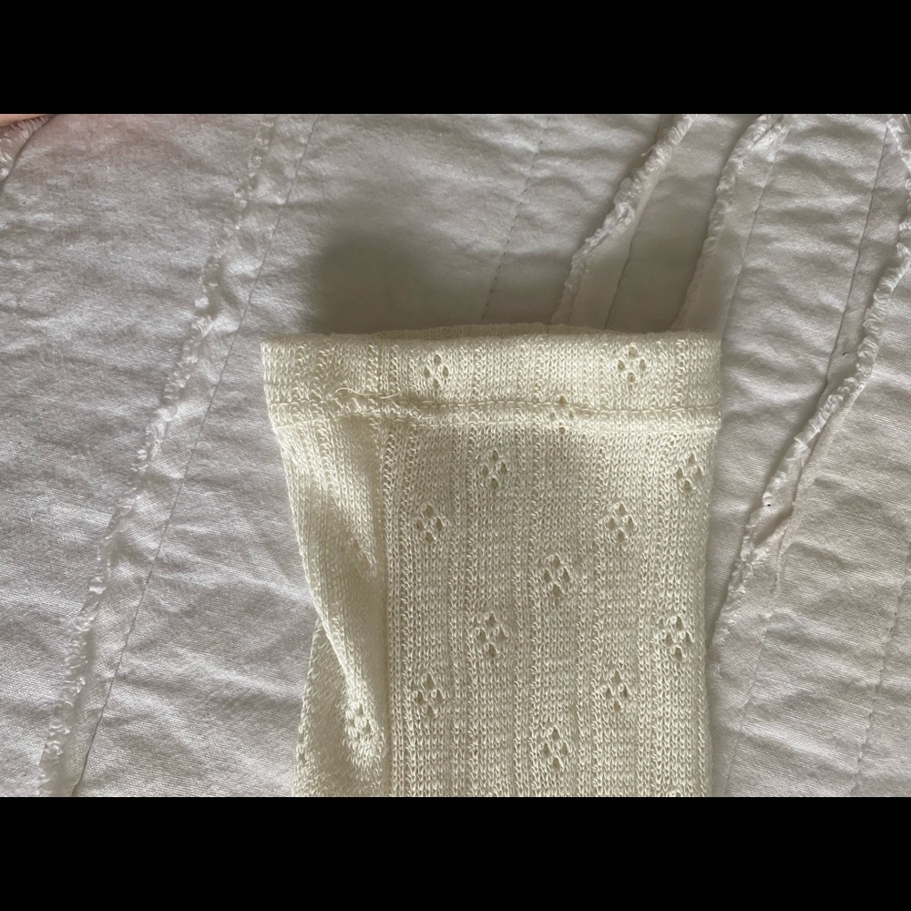 This is a white ruffled and detailed crop top - Picture 3 of 7